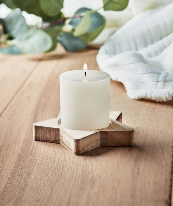 Star shaped wooden decorative base with a vanilla fragrenced candle