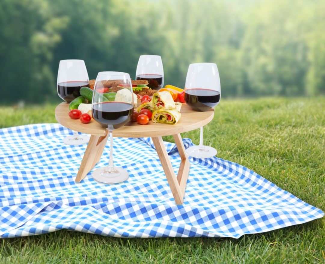 Foldable picnic table made of wood with logo